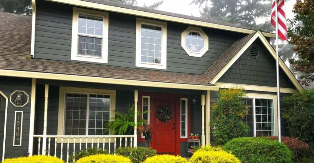 A newly updated home with new siding, windows, front door, and more to help illustrate How to Increase Your Home Value through Exterior Renovation